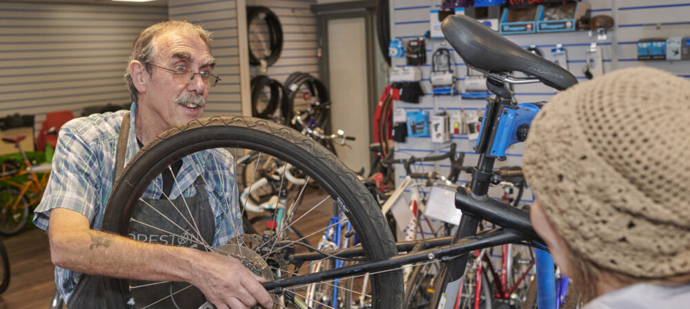 Man holding Bike tyre at Preston Pedals