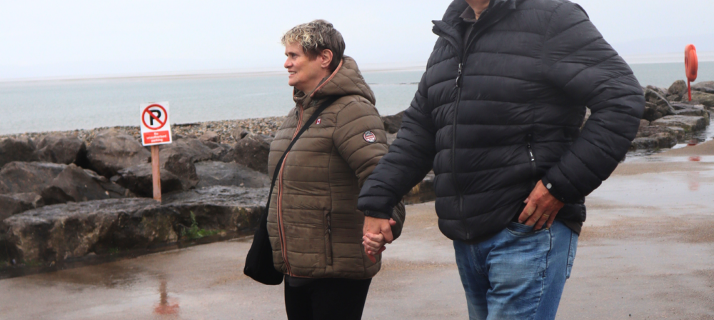 Couple walking on the beach