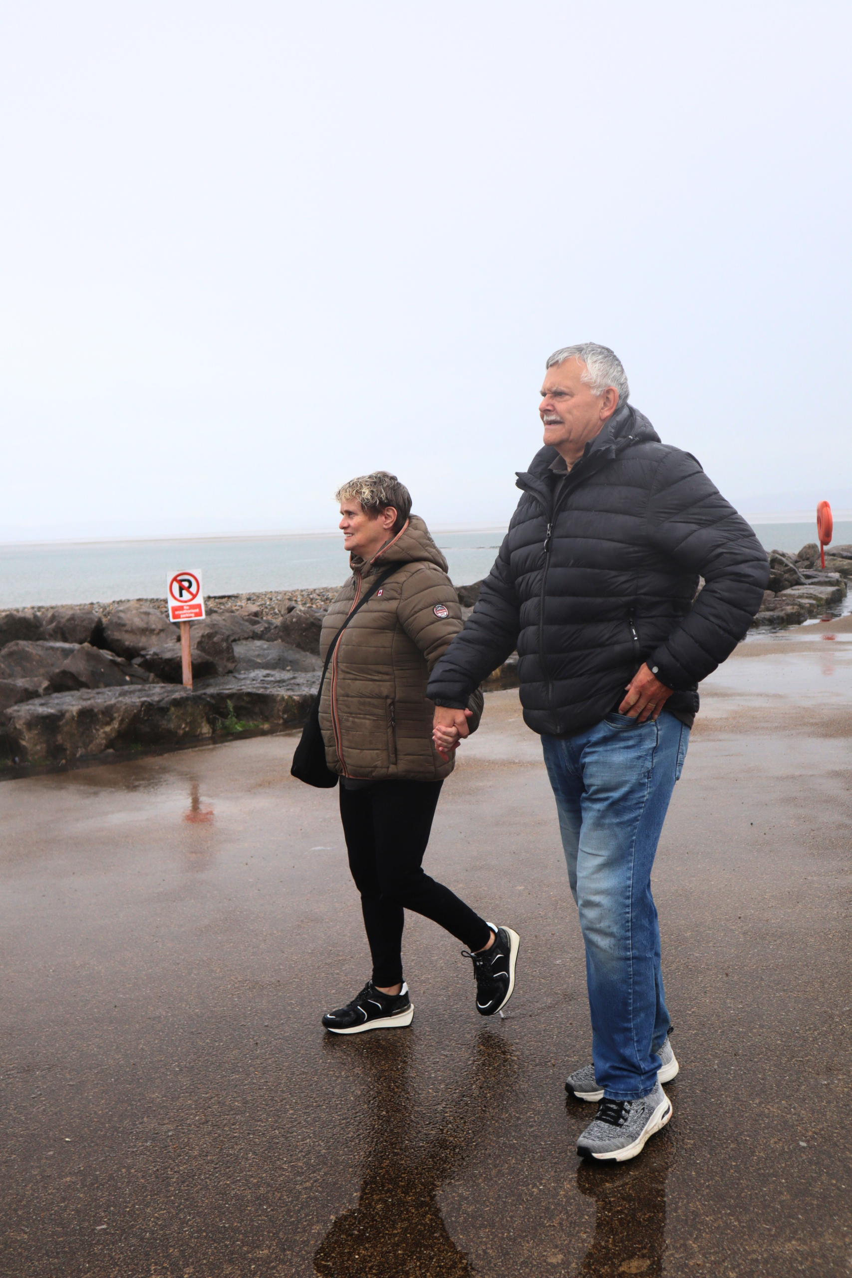 Couple walking on the beach