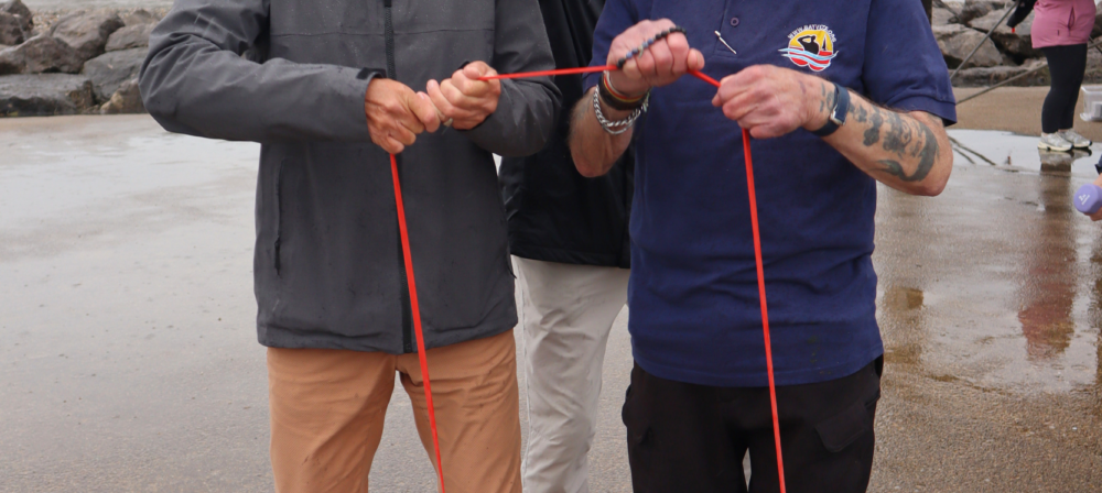 Two men holding walking poles